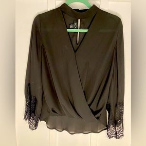 Beautiful black BCX top with lace detail